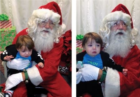 Landon trying to escape Santa...but he might be calming down at the sight of a lollipop.