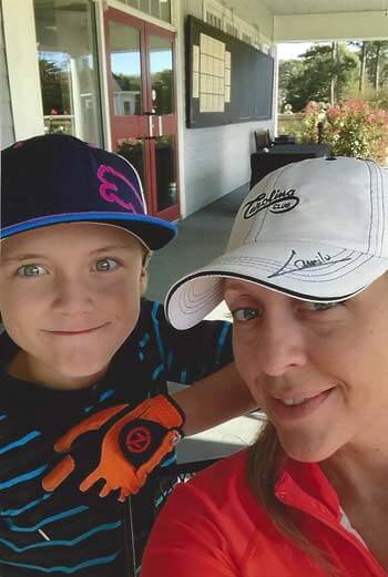 Slater Mobley poses with his mom, Kara Mobley.