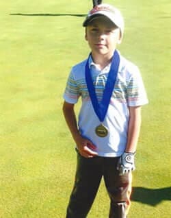 Slater Mobley with golf medal