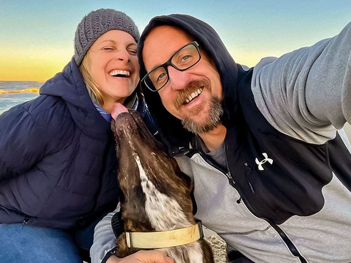 Wes & Beth Snyder, with their affectionate dog Jr. Wes moved to the Outer Banks to begin his photography career in 2017, meeting Beth within 3 months of arriving. An integral part of the family business, Beth is a full-time photographer and surgical nurse at Outer Banks Hospital.
