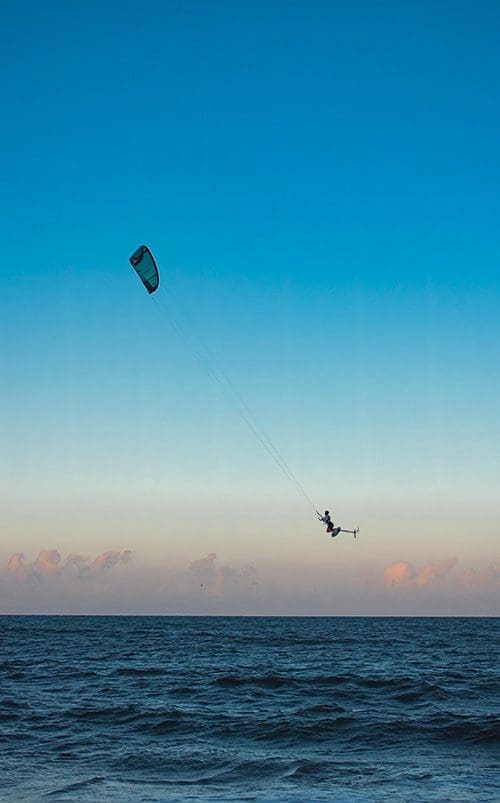 Lucas Meyjes, taking a break from wing foiling instruction, shown boosting roughly 20 feet in the air oceanside in Rodanthe. Photo provided by Lucas Meyjests