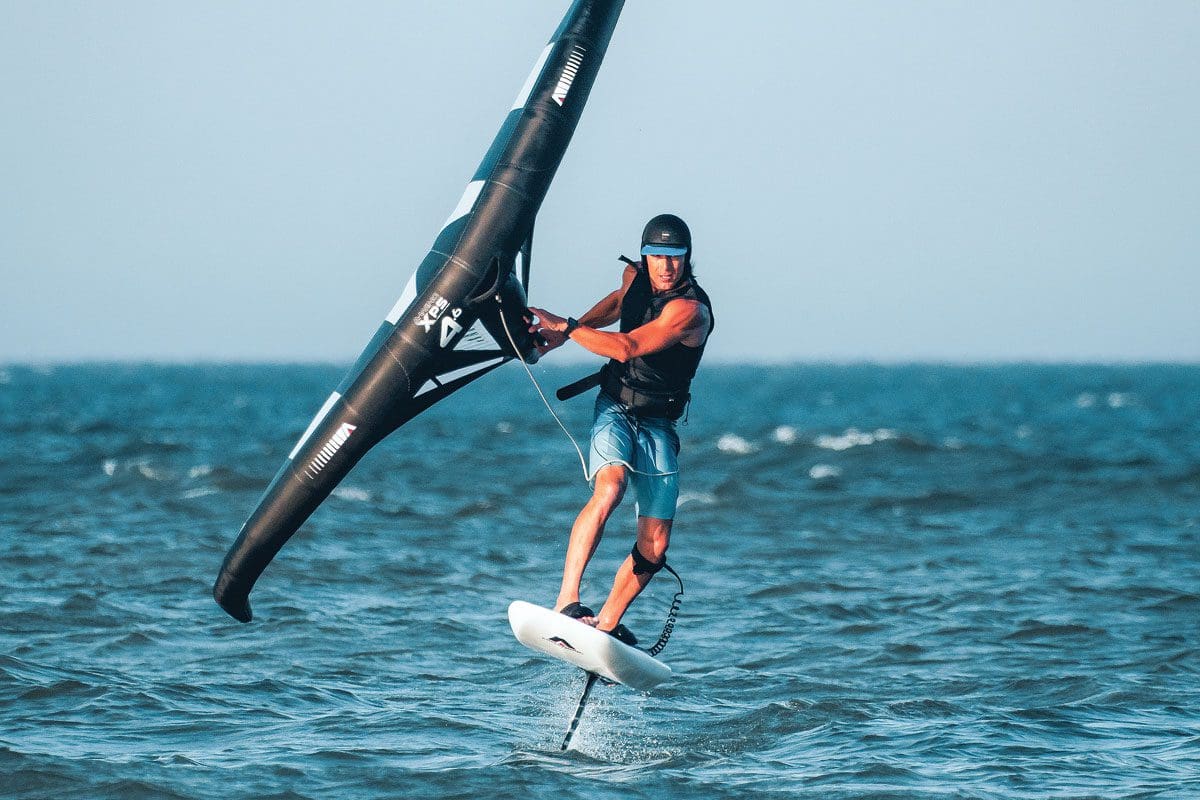 “The future of action sports” is how Giri Watts of Kitty Hawk Kites refers to wing foiling. For participants and viewers alike, the experience of wing foiling remains a 'see it to believe it' activity as riders glide atop the waves and take to the sky for one thrilling ride after another. Photo by Peter Watts