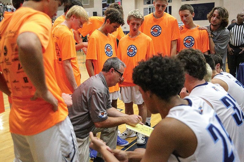 Chad Williams draws up a play for his team during the 2023 Good Guys vs Cancer Basketball Showcase. Since Williamsstarted Good Guys in 2018 as a tribute to his father, the event has been about far more than basketball, with thousands of dollars raised for locals as well as the national Coaches vs Cancer effort. FFHS Shorelines Yearbook File Photos
