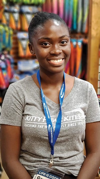 Jamaican J-1 student, Gary-Ann Clark split time this summer between Kitty Hawk Kites and Fresh Market. Studying Psychology at the University of the West Indies, Clark’s favorite activity while here was hang gliding. Photo by Jeff Donohue Phoneography