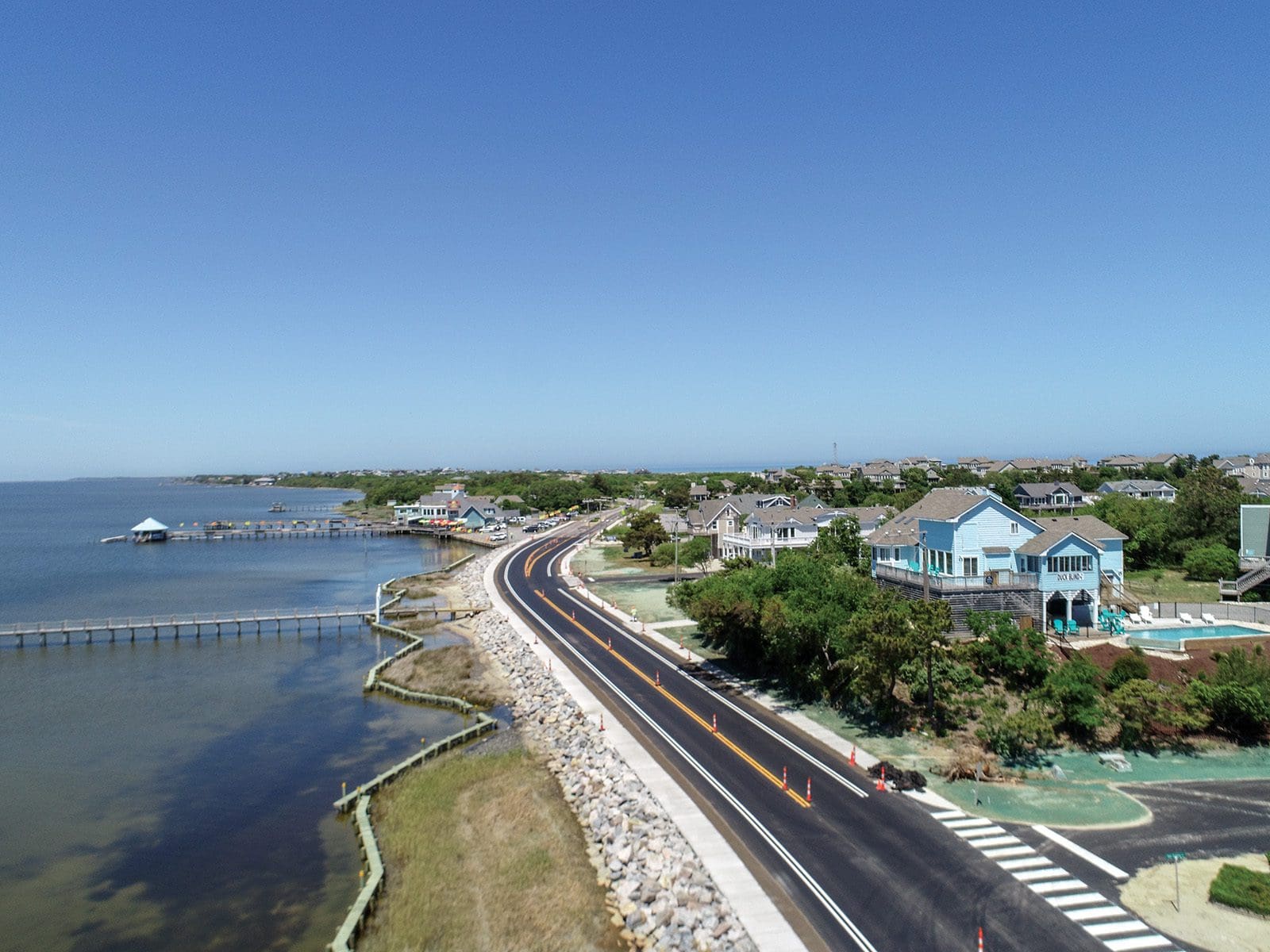 Top: The impetus for the Town Park Shoreline Stabilization project was two decades of gradual but significant erosion of coastal marsh grasses intensified by hurricanes and tropical storms in 2011, 2016, and 2018. Designed by Vanasse Hangen Brustlin (VHB), construction by D&B Bulkheads began in the fall and wrapped up this spring.