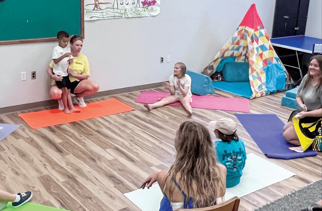 A guided yoga lesson, provided to Wave Camp campers.
